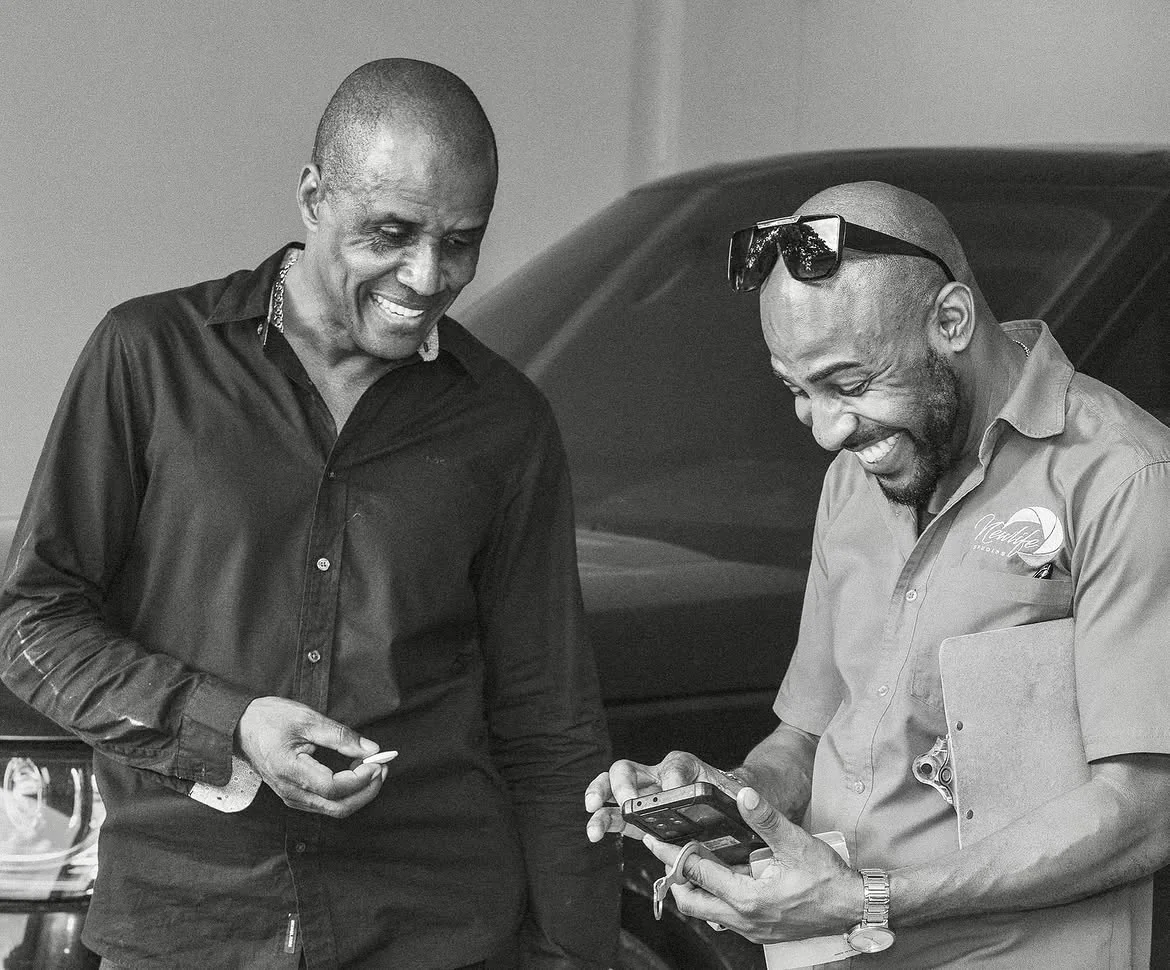 Peter Perry sharing a light moment with a colleague at work