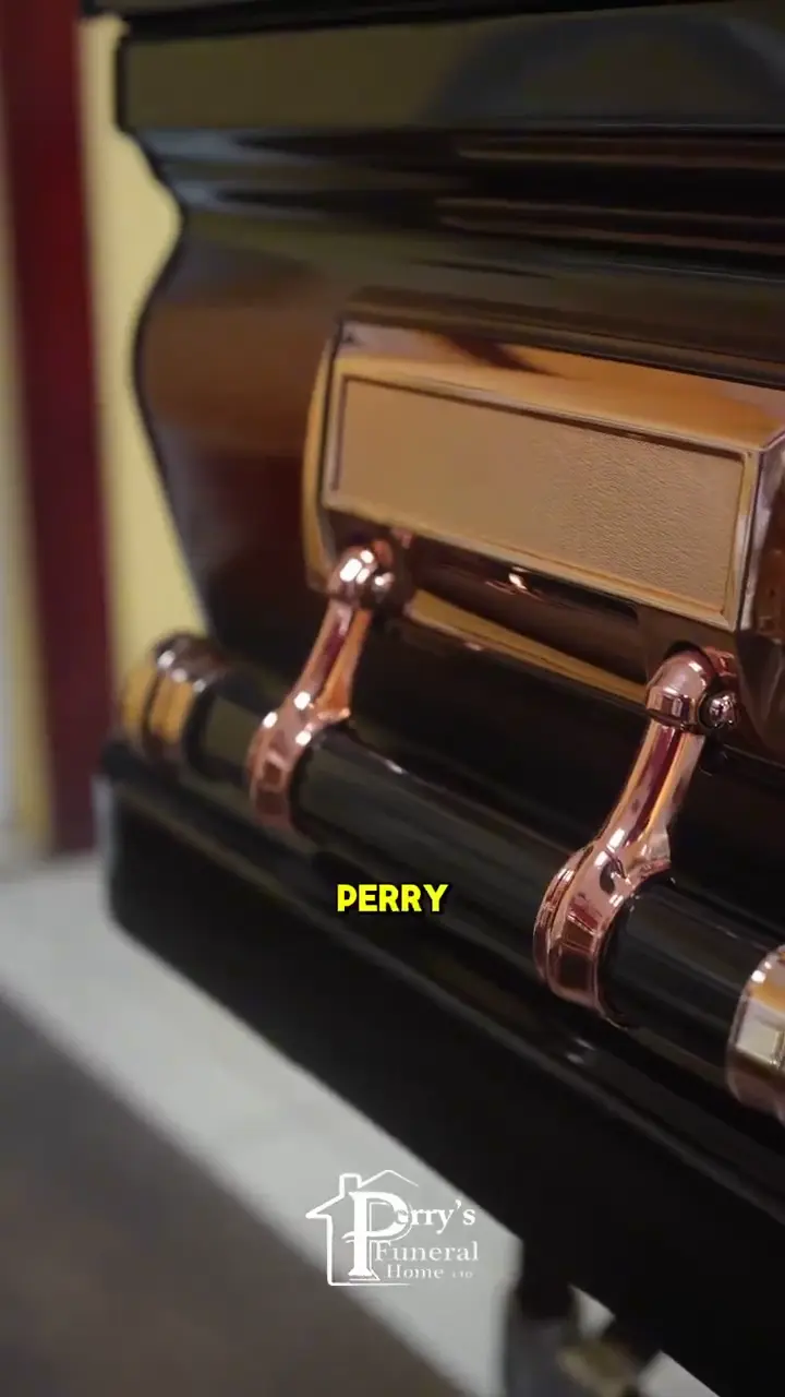 Close detail of a polished casket prepared for a funeral service